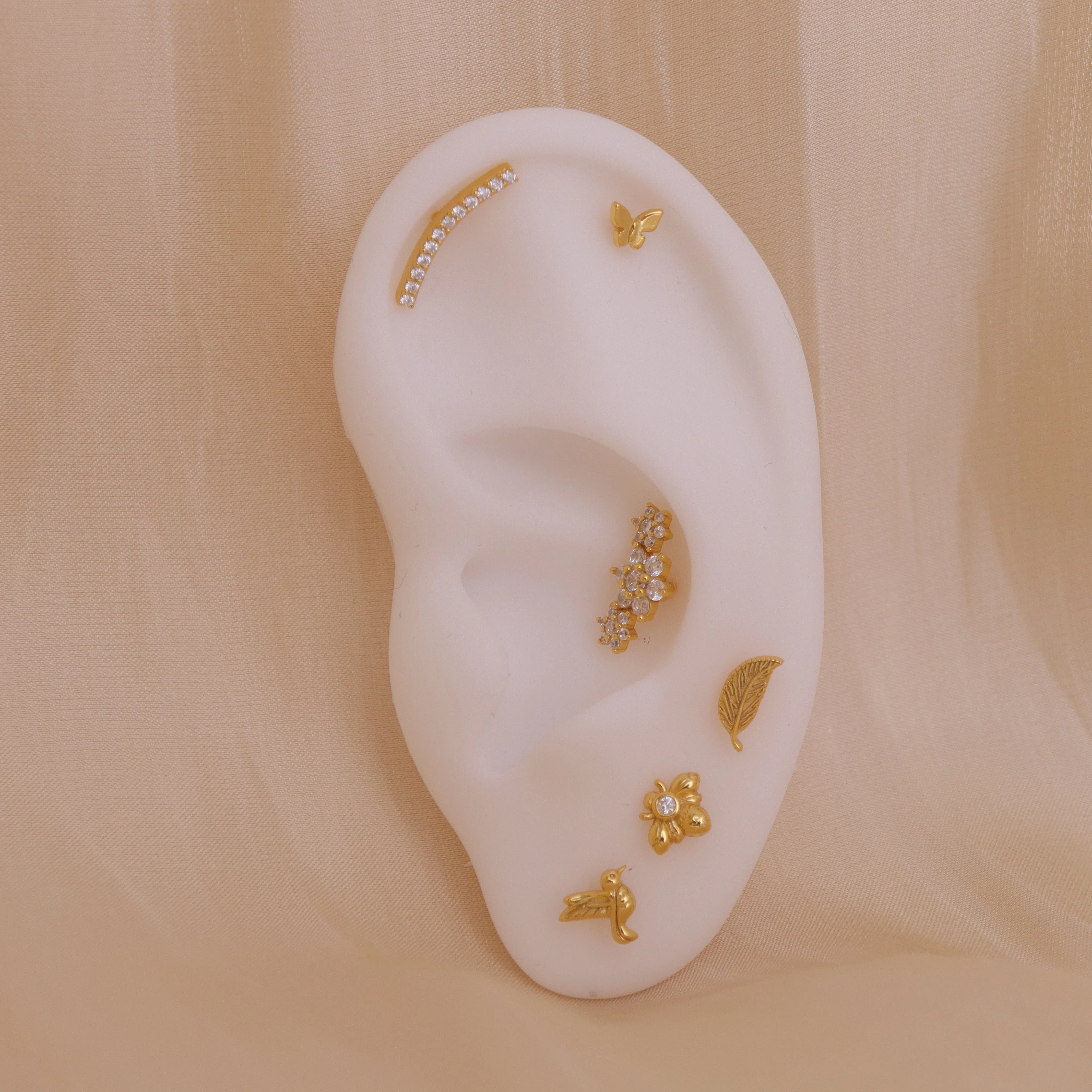 Leaf Me Alone Flat Back Stud Earring (18G)